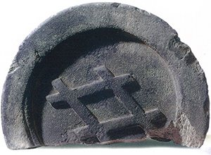 The eave-end roof tile, imprinted with a well curb, Sumitomo’s trademark